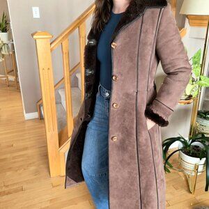 Real shearling/sheepskin Leather Attic Vintage long coat with leather details.